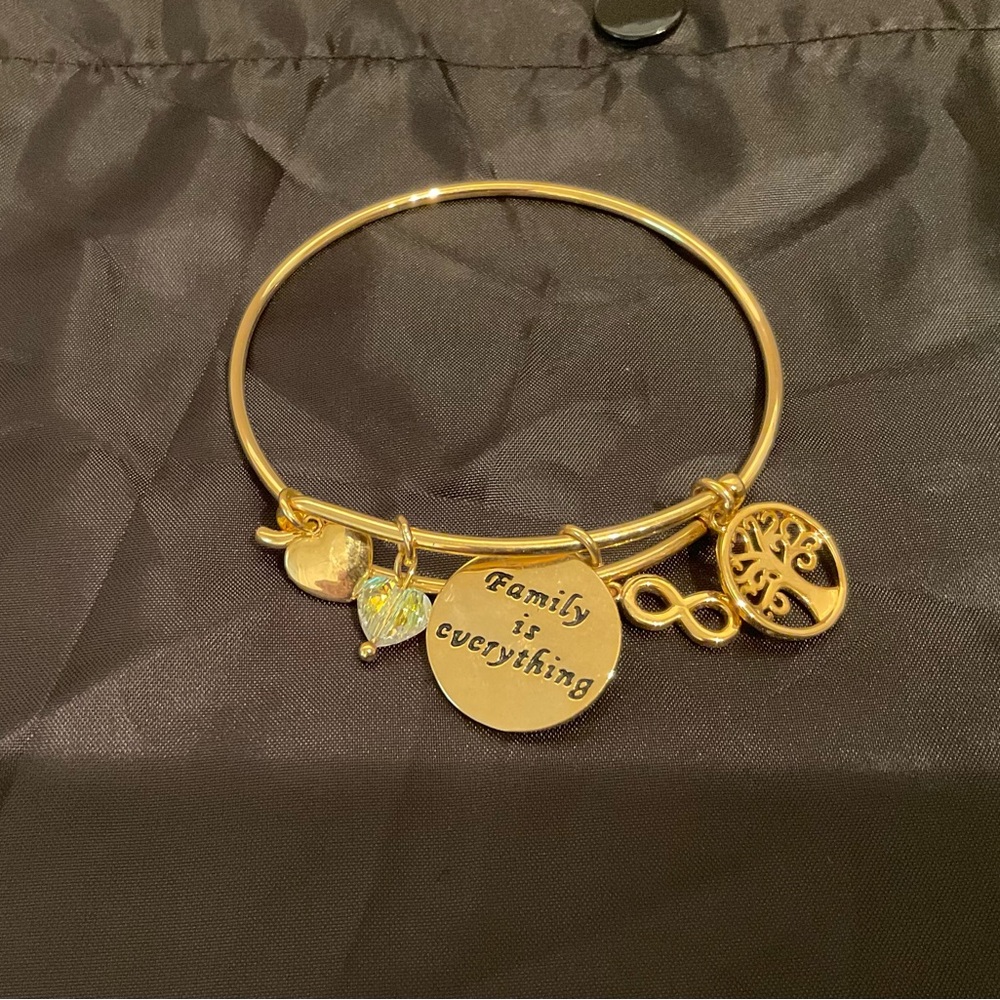 Gold bangle charm bracelet